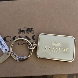 Coach White And Gold Bag Charm